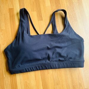 Athleta, navy blue sports bra size medium removable pads